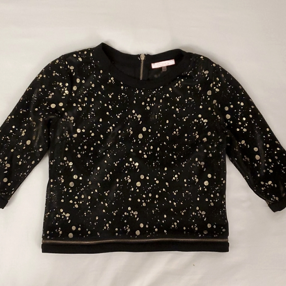 Black with gold paint splotches